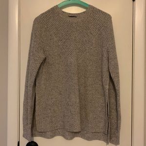 Club Monaco sweater with large side slits on both sides.